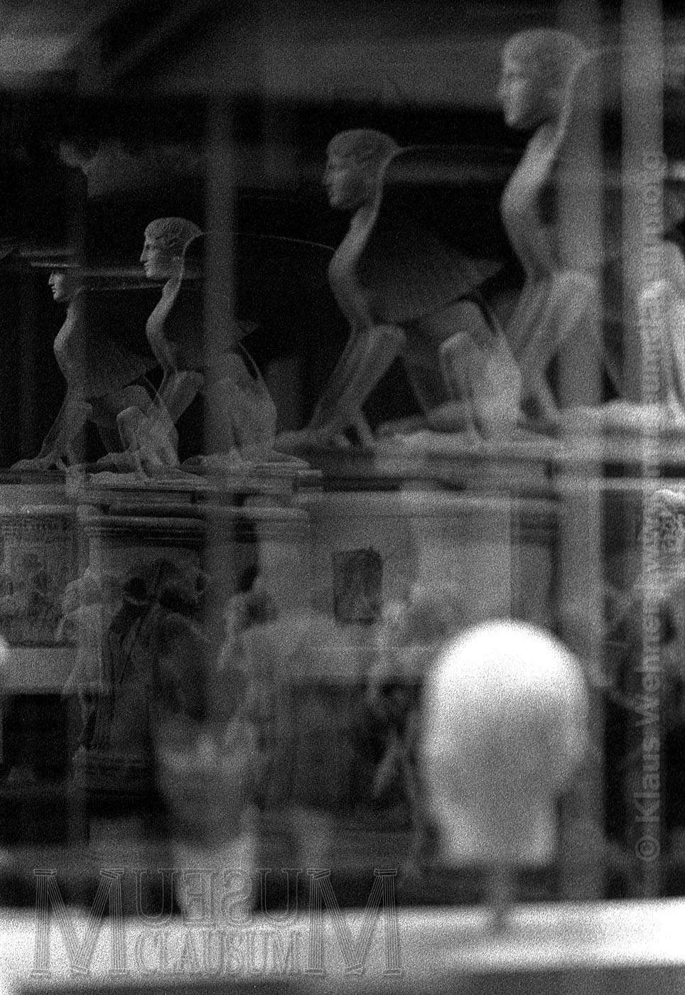A black and white photograph showing a scene inside the British Museum