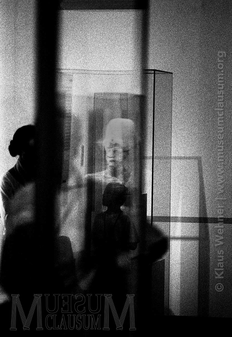 Two black and white photographs showing scenes inside the British Museum galleries