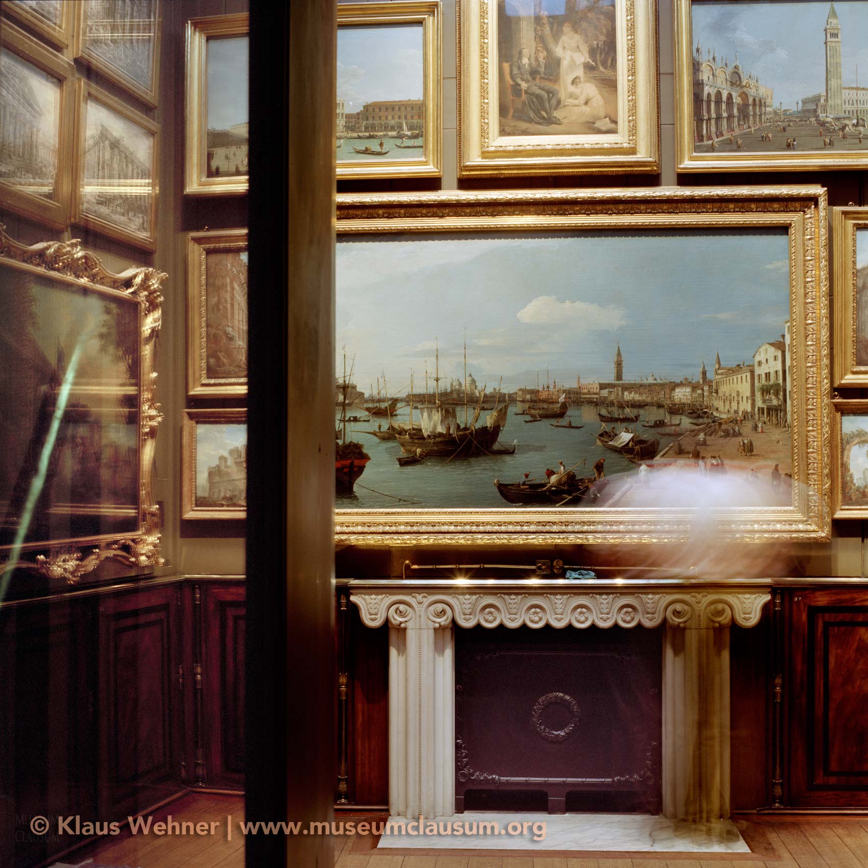 Sir John Soane's Museum: Sir John Soane's Museum: View into the Picture Room with a motion blur from a guard polishing the brass.